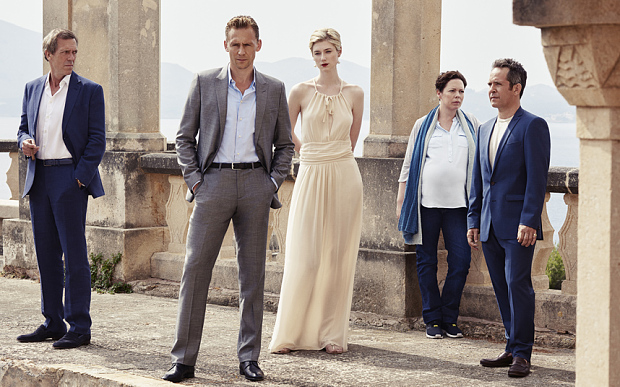 Tom Hiddleston as Jonathan Pine, Tom Hollander as Major Corkoran, Elizabeth Debicki as Jed Marshall, Olivia Colman as Angela Burr, and Hugh Laurie as Richard Roper - The Night Manager _ Season 1, Gallery - Photo Credit: Mitch Jenkins/The Ink Factory/AMC Itís the first TV adaptation of a le CarrÈ novel in more than 20 years and the first adaptation of The Night Manager. The novel, originally released in 1993, has been updated as an contemporary interpretation ñ the original novel is based predominantly in South America and Mexico - and sees Roper selling weapons to the Colombian drug cartels. The story has been updated so that it is set in the modern day Middle East ñ it is very current with the first episode opening with the Arab Spring in Cairo. Olivia Colmanís character, Angela Burr, was written as a man in the novel (Leonard Burr) but the decision was made to make the character female to modernise the story. Olivia was also pregnant when she got the part, so they incorporated this into the story too. Susanne Bier (director): ìWe had decided that Burr should be played by a woman, rather than a man as in the book, because we thought there was an exciting chemistry between a woman and a man engaging in the power struggle that Roper and Burr have.î Hugh Laurie has been trying to get the adaptation made for many years, having read the novel when he was young ñ he tried to get the rights but they were owned by Sydney Pollock who originally tried to make the novel into a film. Hugh Laurie (plays Roper): ìI fell in love with this book when I first read it back in 1993. Iíd worshipped le CarrÈ since I was a teenager, but this story, in particular, I found endlessly intriguing, powerful and romantic, mythic almost.î
